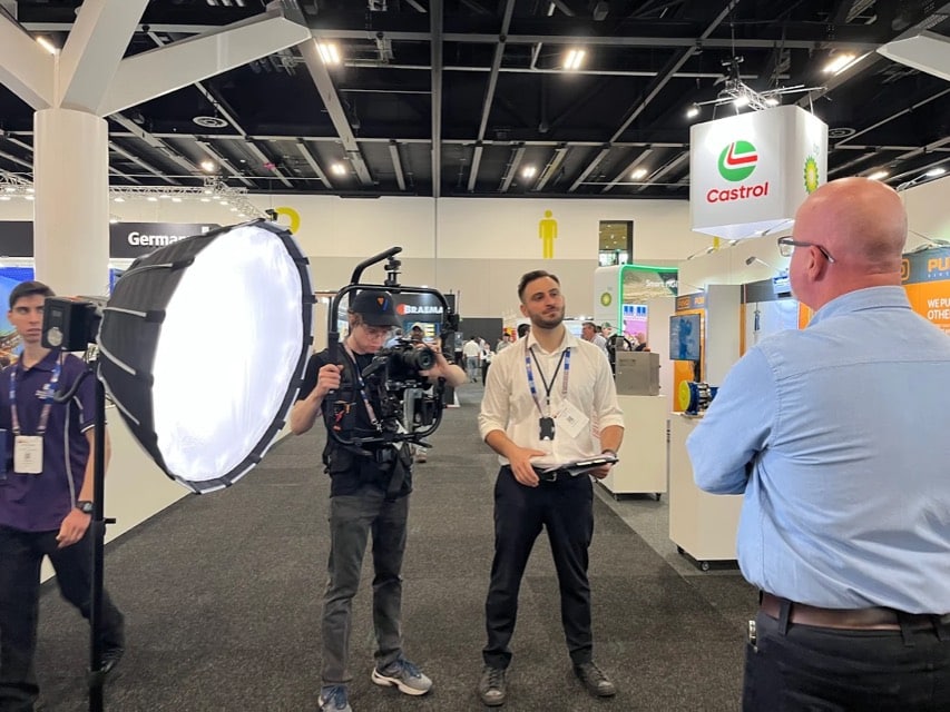 Viewix crew filming at a trade expo stand