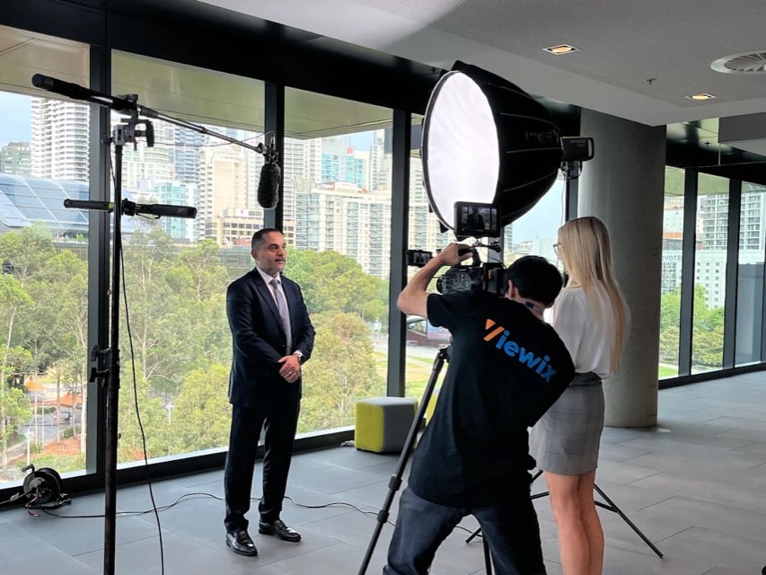Viewix filming a corporate interview in a high-rise Sydney office